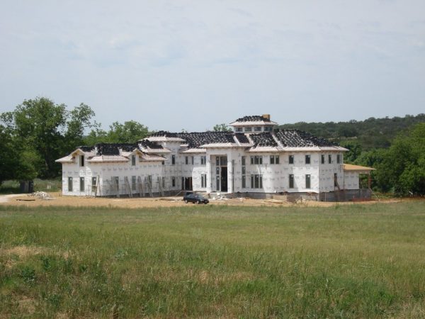 Exterior Taking Shape Bellagio Estates on Lake Austin by Zbranek Holt Custom Homes Austin Luxury Custom Home Builder