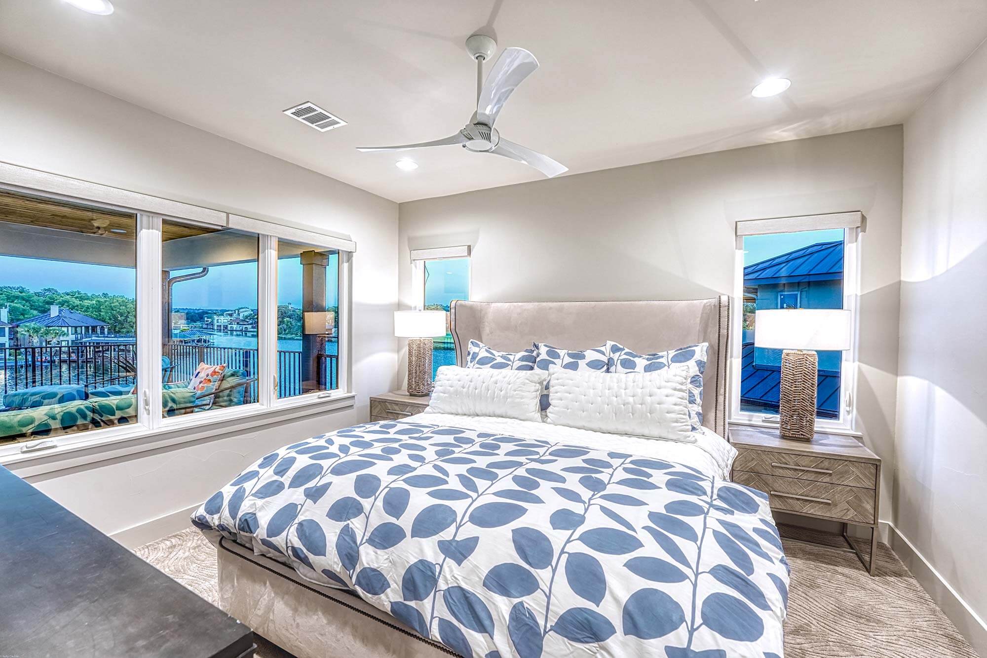 Zbranek and Holt Custom Homes Soft Modern Transitional Bedroom 4 Overlooking Lake and Pool