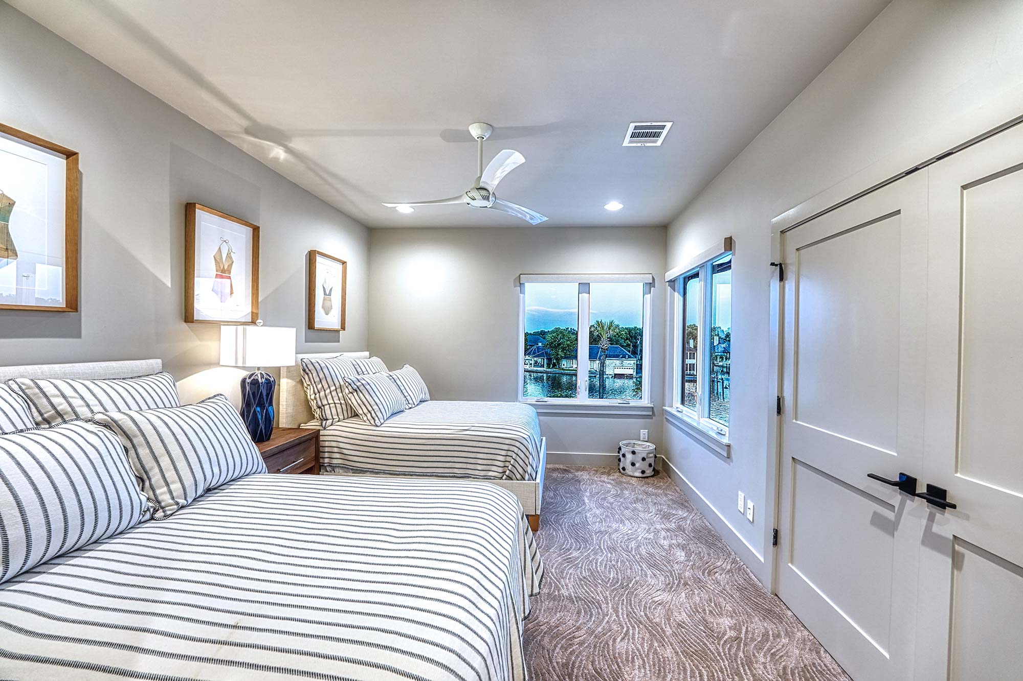 Zbranek and Holt Custom Homes Soft Modern Transitional Guest Room 2 Overlooking Lake and Pool