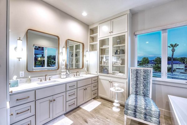 Zbranek and Holt Custom Homes Soft Modern Transitional Main Bedroom Bath With View to Pool and Lake
