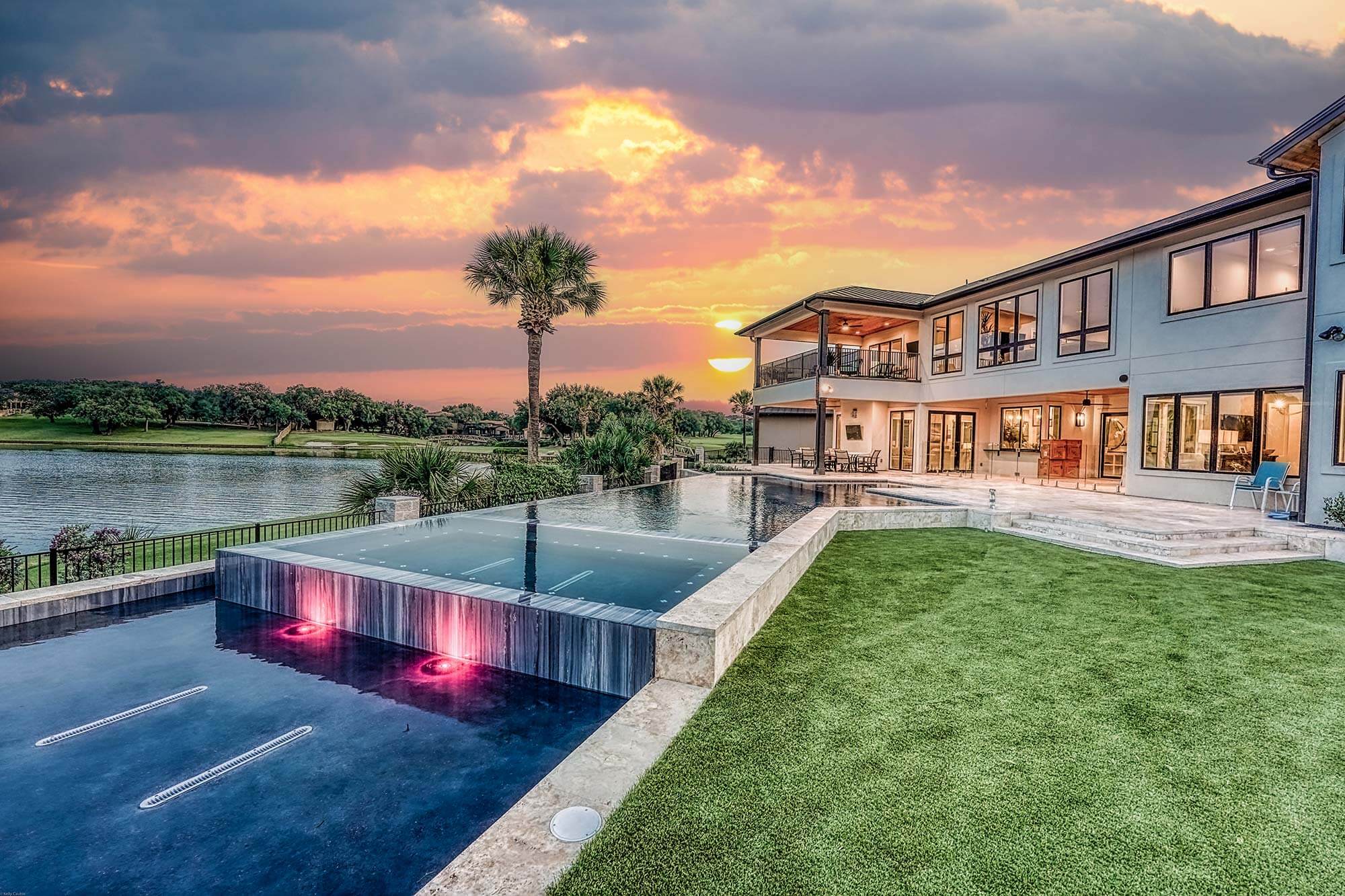 Zbranek and Holt Custom Homes Soft Modern Transitional Outdoor Living Overlooking Lake and Pool