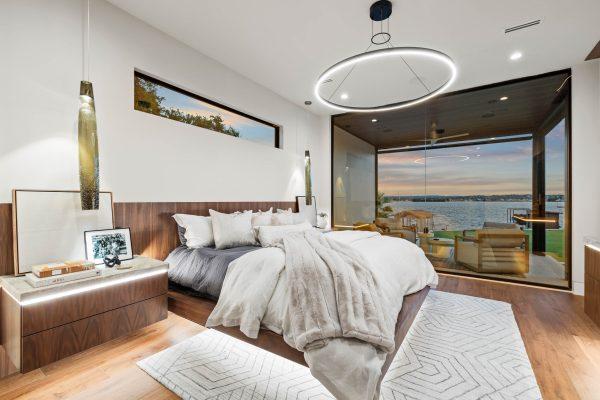 Zbranek Holt LakeLBJ Luxury Master Bedroom Panoramic Lake View Night Lighting