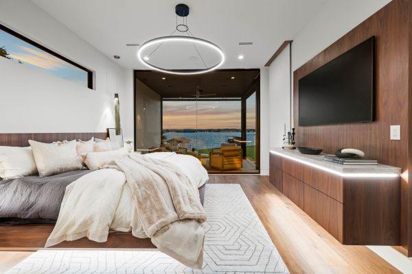 Zbranek Holt LakeLBJ Luxury Master Bedroom TV Wall Mood Lighting Night View