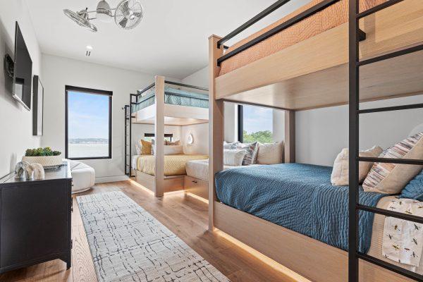 Zbranek Holt LakeLBJ Modern Luxury Lakehouse Bunk Bedroom Lake View Custom Bunk Beds Cozy Design
