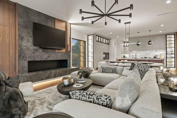 Zbranek Holt LakeLBJ Modern Luxury Lakehouse Living Room Fireplace Open Concept Kitchen