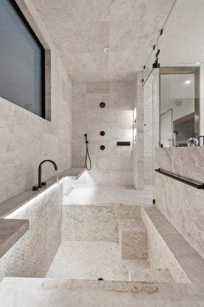 Zbranek Holt LakeLBJ Modern Luxury Lakehouse Master Shower Wet Room Spa Features