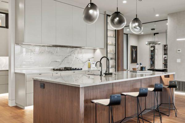 Zbranek Holt LakeLBJ Signature Marble Fusion Kitchen Walnut Island Sculptural Lighting