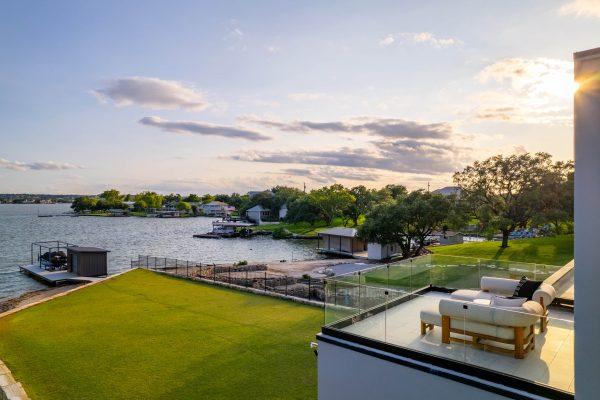 Zbranek Holt Lake LBJ Modern Luxury Lakehouse Terrace View Lakefront Sunset Glass Railing