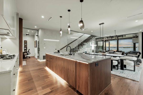 Zbranek Holt Modern Luxury Lakehouse Walnut Island Marble Counter Glass Railing Lake View