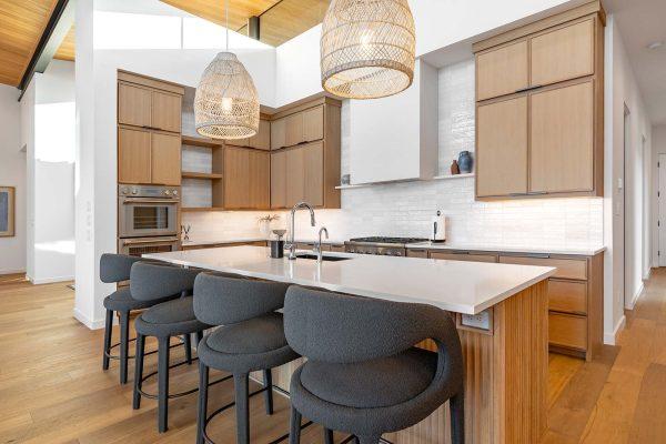 Modern Organic Lakehouse Kitchen Wood Cabinetry Quartz Island Pendant Lighting Zbranek and Holt Custom Homes