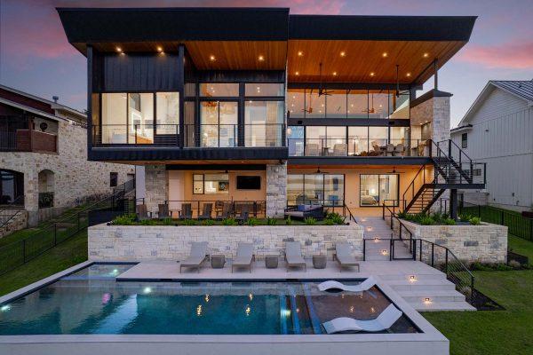 Modern Organic Lakehouse Rear Elevation Pool Outdoor Living Zbranek and Holt Custom Homes