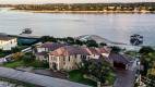 Zbranek-and-Holt-Custom-Homes-Waterfront-European-Luxury-Front-Drone-Lake-View