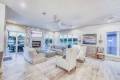 Zbranek-and-Holt-Custom-Homes-Soft-Modern-Transitional-Living-Area-Overlooking-Appleadhead-Island-Lake-View