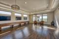 Zbranek-and-Holt-Custom-Homes-Game-Room-Wood-Floor-Shuffle-Board-Table-Contemporary-Lighting
