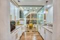 Zbranek-and-Holt-Custom-Homes-Bar-Wood-Floor-Wine-Room-Sunset