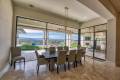 Zbranek-and-Holt-Custom-HOmes-Dinning-Room-Outdoor-Living-Iron-Corner-Window