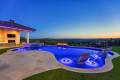 Zbranek-and-Holt-Custom-Homes-Backyard-Pool-Outdoor-Cabana-Sunset