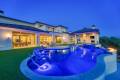 Zbranek-and-Holt-Custom-Homes-Backyard-Sunset-Pool-Pool-Sitting