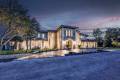 Zbranek-and-Holt-Custom-Homes-Waterfront-European-Luxury-Front-Elevation-Evening