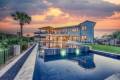 Zbranek-and-Holt-Custom-Homes-Soft-Modern-Transitional-Lake-and-Pool-Exterior-Rear