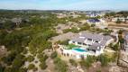 Zbranek-and-Holt-Custom-Homes-Back-Yard-Fly-Over-Pool-