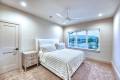 Zbranek-and-Holt-Custom-Homes-Soft-Modern-Transitional-Guest-Bedroom-1-Overlooking-Lake-nd-Pool