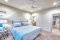 Zbranek-and-Holt-Custom-Homes-Soft-Modern-Transitional-Bedroom-3-to-Bathroom